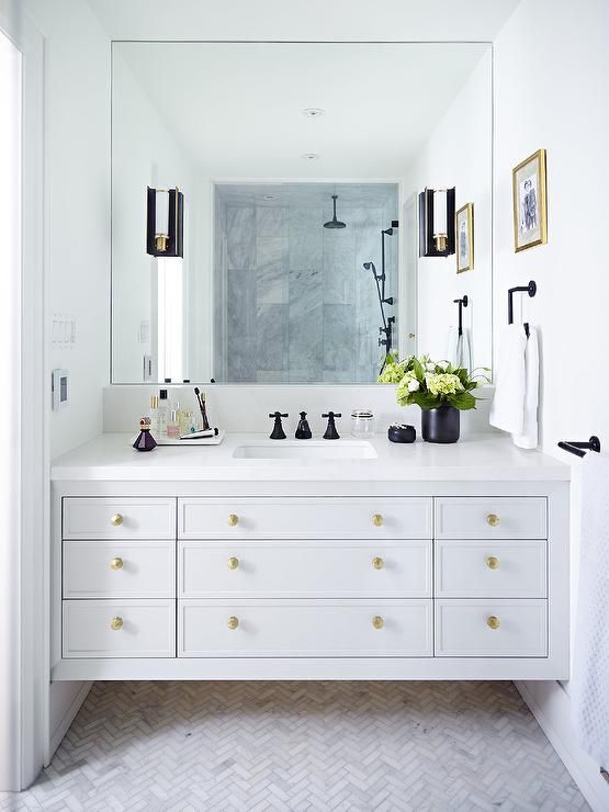 How to make a small bathroom feel big - Use large mirrors