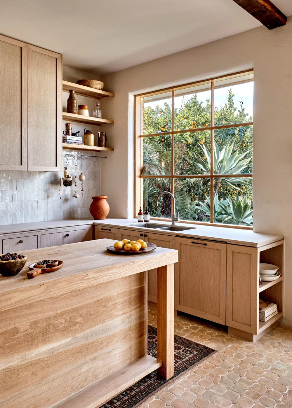 Create a custom kitchen design by adding Large windows over sink area