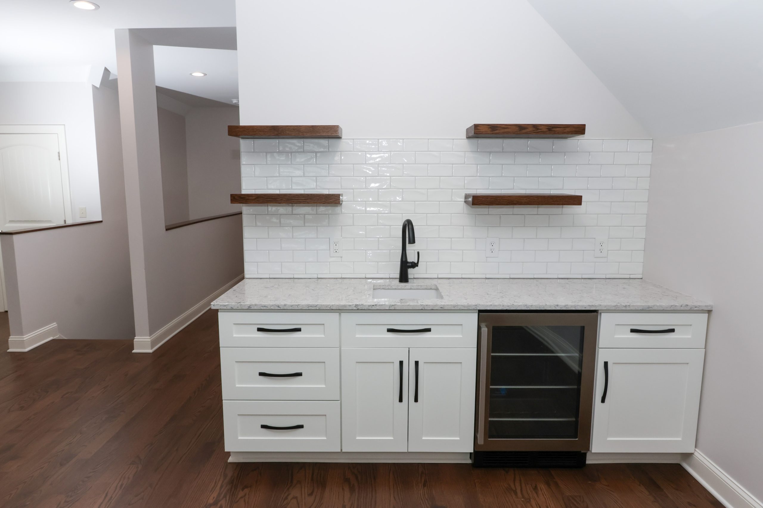 wet bar with beverage fridge