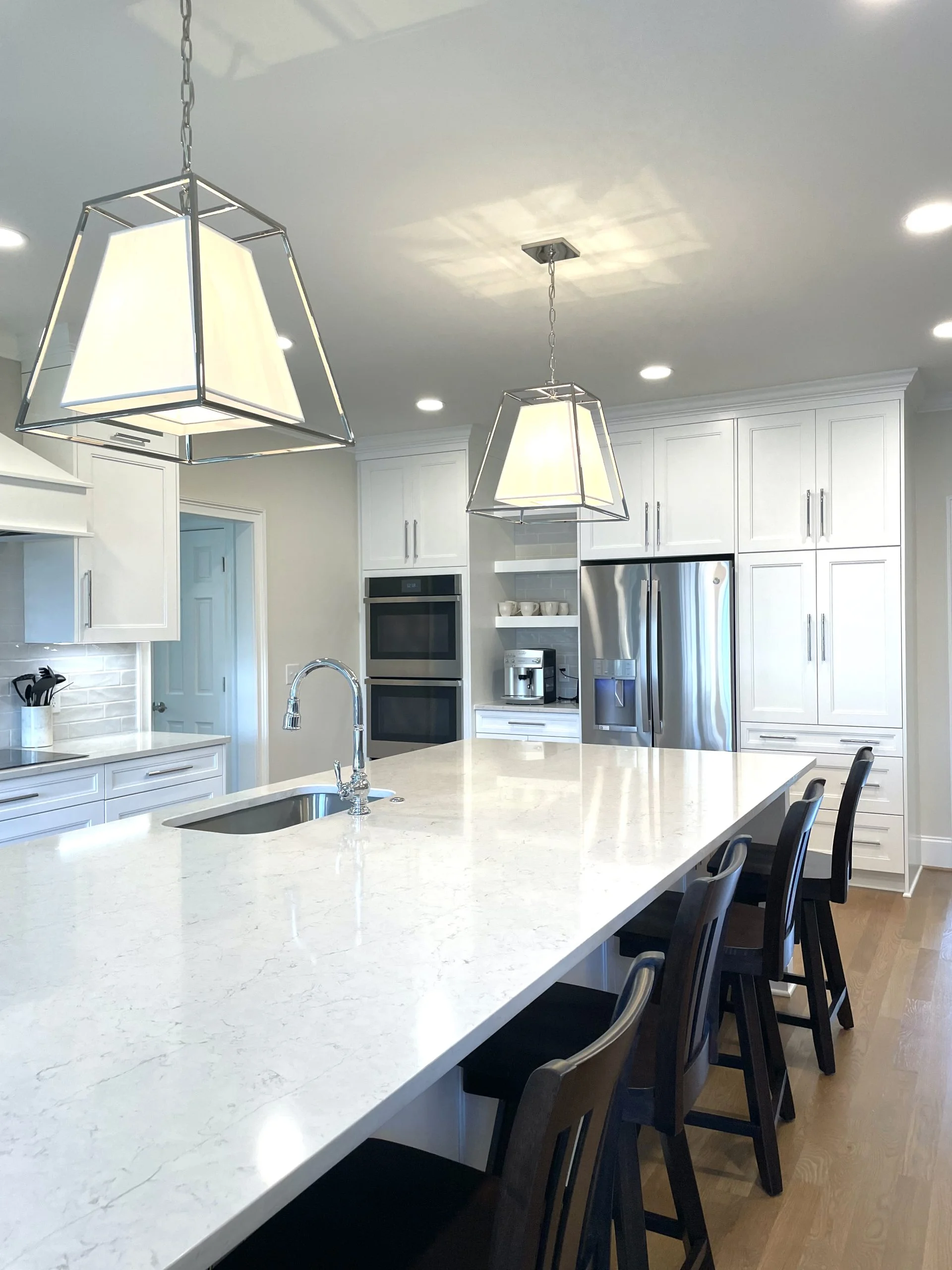 Large kitchen remodel with seating for 4 at a bright island