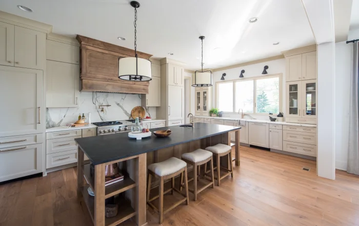Large kitchen with warm wood tones and large island