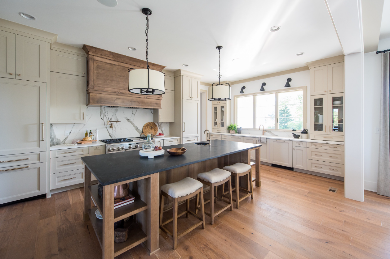 Large kitchen with warm wood tones and large island