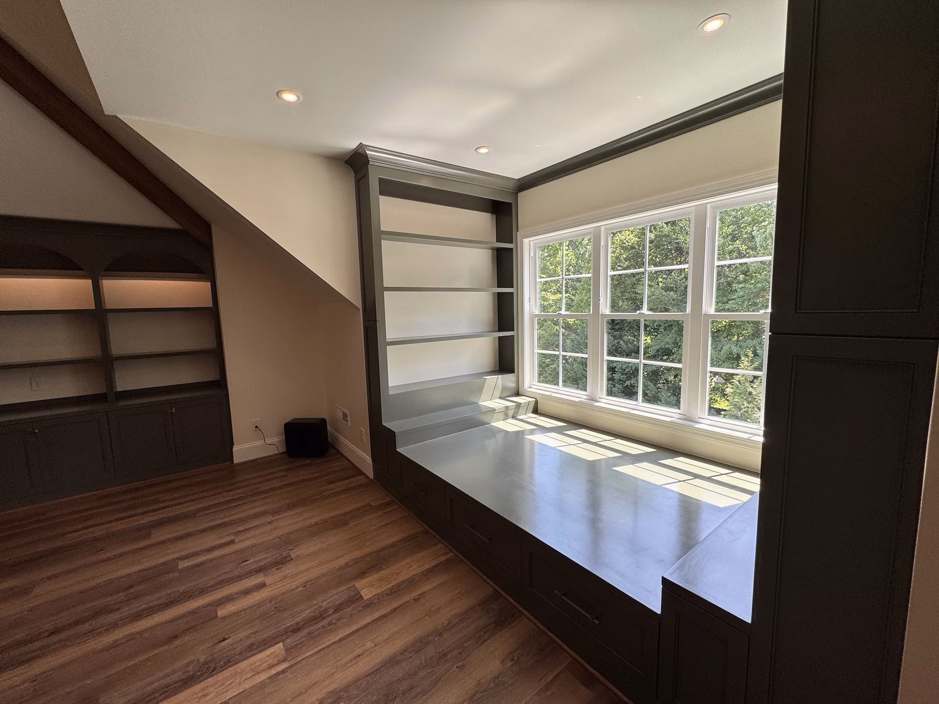 Third-floor Custom Window sleeping nook with builit in bookshelfs and drawers Third-floor Custom Window sleeping nook with builit in bookshelfs and drawers