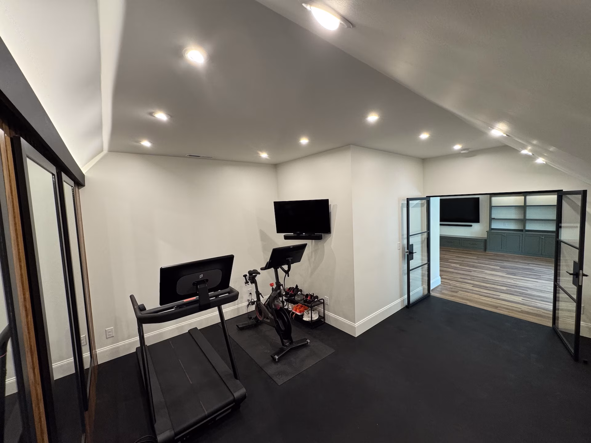 gym room with mounted TV gym room with mounted TV